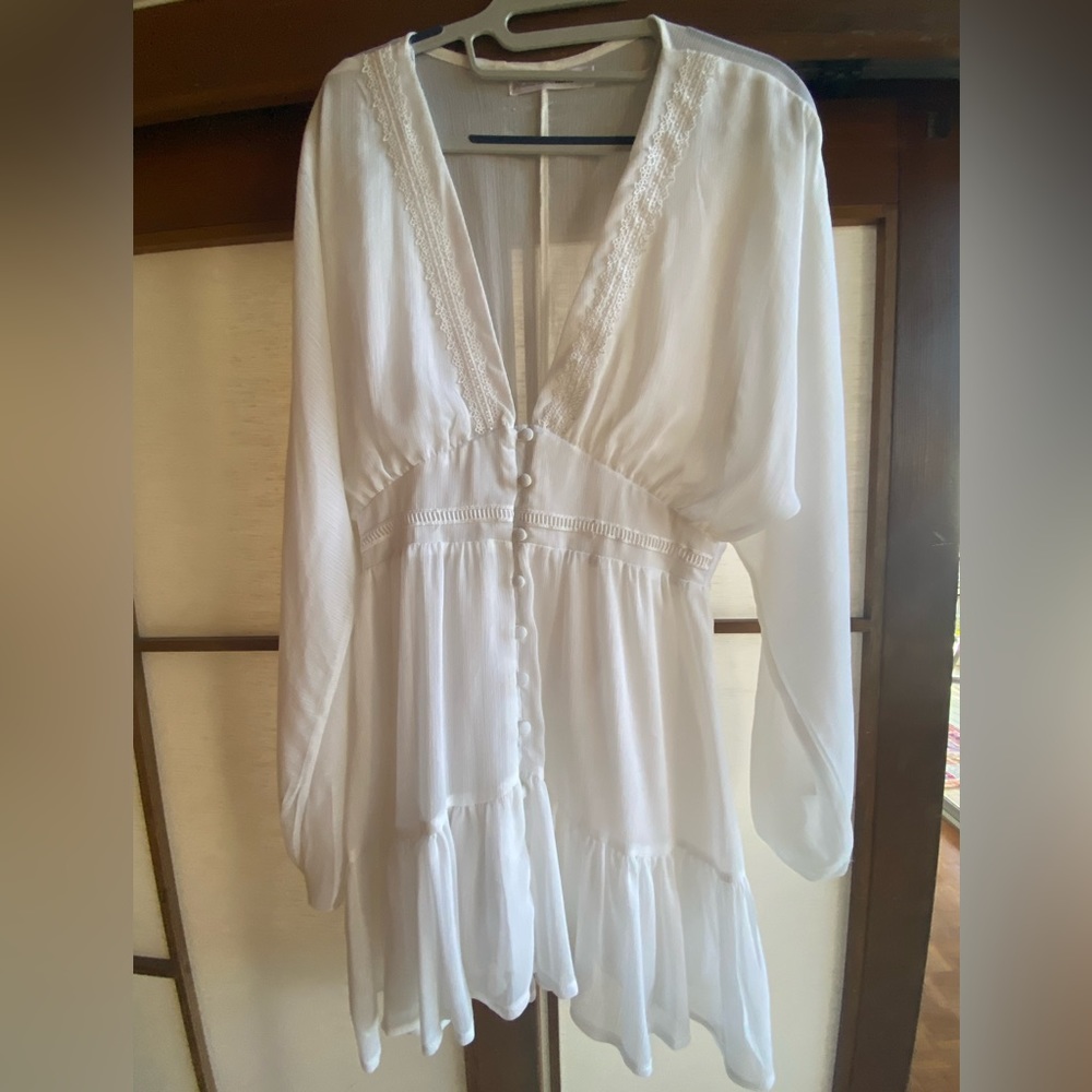 White dress w/ small detailing and buttons